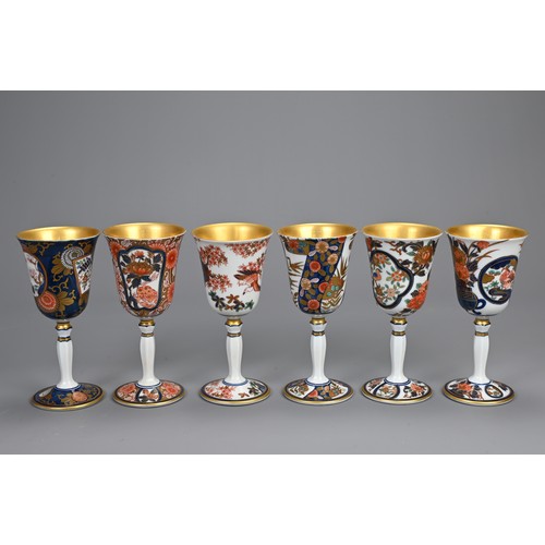 293 - A SET OF SIX JAPANESE ARITA YAKI PORCELAIN WINE CUPS. Individually decorated with various floral sce... 