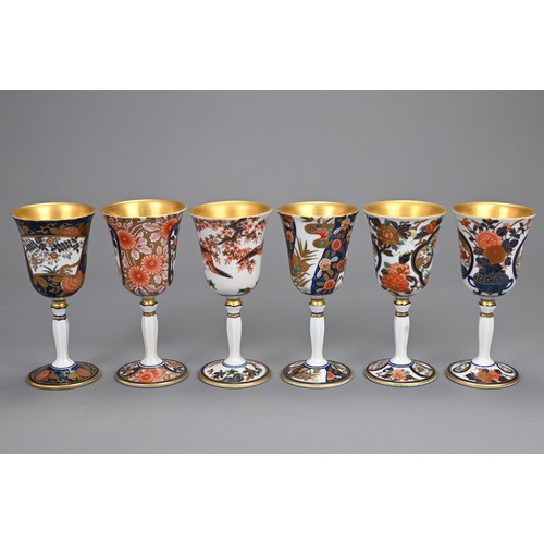 293 - A SET OF SIX JAPANESE ARITA YAKI PORCELAIN WINE CUPS. Individually decorated with various floral sce... 