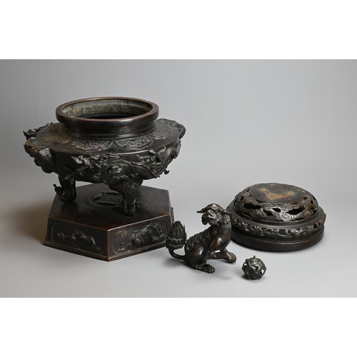 294 - A LARGE JAPANESE BRONZE KORO, MEIJI PERIOD. Heavily cast with dragons mounted on a hexagonal base wi... 