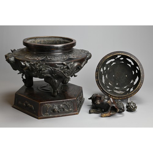 294 - A LARGE JAPANESE BRONZE KORO, MEIJI PERIOD. Heavily cast with dragons mounted on a hexagonal base wi... 