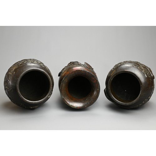 52 - THREE JAPANESE BRONZE VASES, PROBABLY MEIJI PERIOD, 19/20TH CENTURY. To include a pair of ovoid jars... 