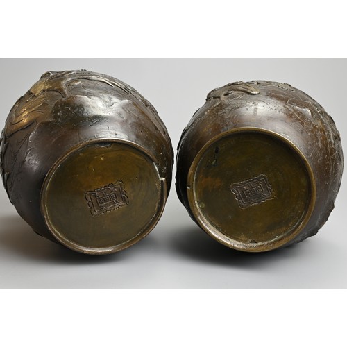 52 - THREE JAPANESE BRONZE VASES, PROBABLY MEIJI PERIOD, 19/20TH CENTURY. To include a pair of ovoid jars... 