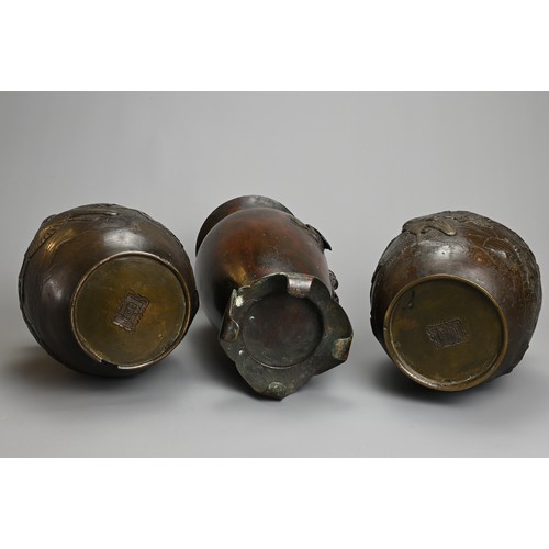 52 - THREE JAPANESE BRONZE VASES, PROBABLY MEIJI PERIOD, 19/20TH CENTURY. To include a pair of ovoid jars... 