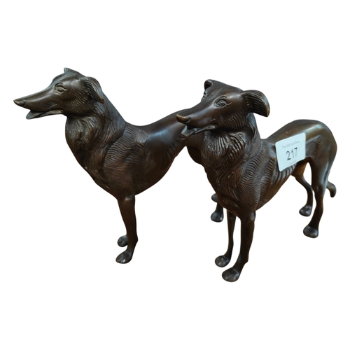 217 - PAIR OF BRONZE DOGS