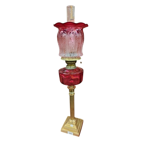 219 - ANTIQUE RUBY OIL LAMP COMPLETE