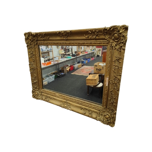 128 - GILT FRAMED MIRROR