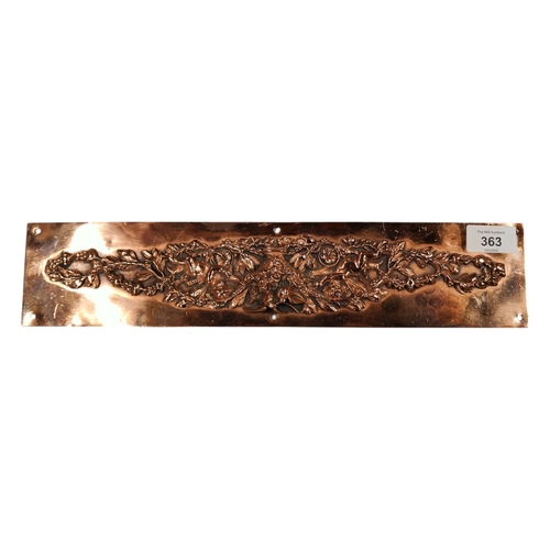 363 - A COPPER DOOR PLATE WITH INTRICATE RELIEF, CHERUBS AMONGST FOLIAGE