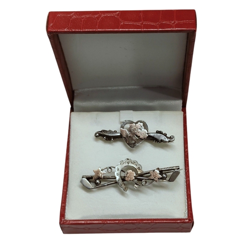 142 - 2 VICTORIAN SILVER AND GOLD FRONTED BROOCHES ONE SWEETHEART AND ONE GOLF THEMED 6.45G