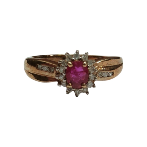 52 - 9CT YELLOW GOLD RUBY AND DIAMOND CLUSTER RING 2.5G SIZE M AND A HALF