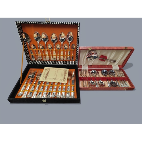 102 - 2 CUTLERY SETS