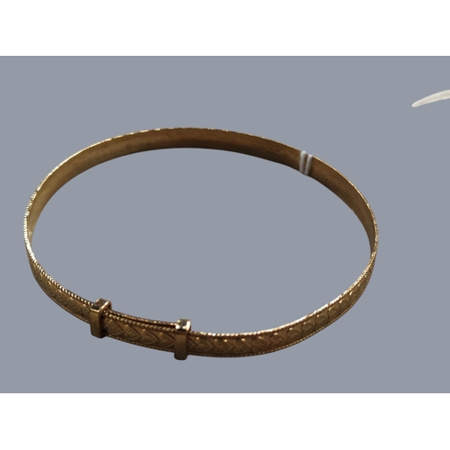 426 - 9 CARAT ROLLED GOLD BANGLE