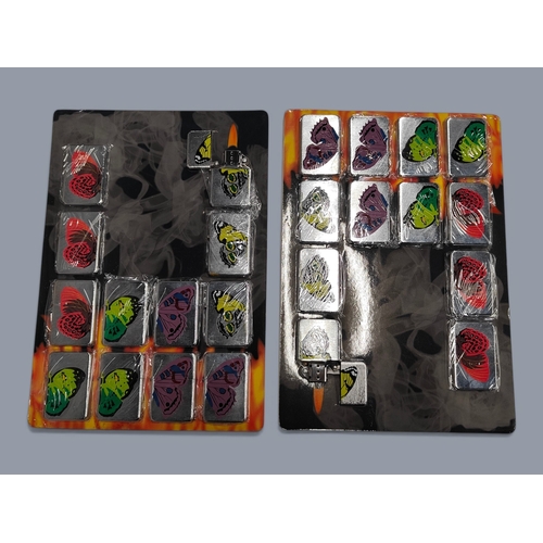 73 - 2 FOLDERS OF LIGHTERS