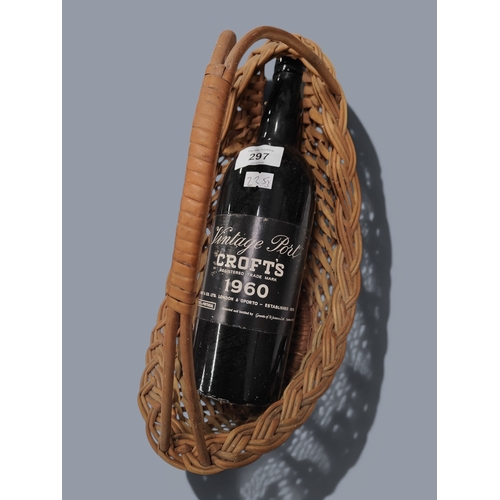 297 - VINTAGE BOTTLE OF PORT IN BASKET