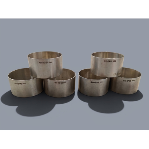 410 - SET OF 6 SILVER NAPKIN RINGS