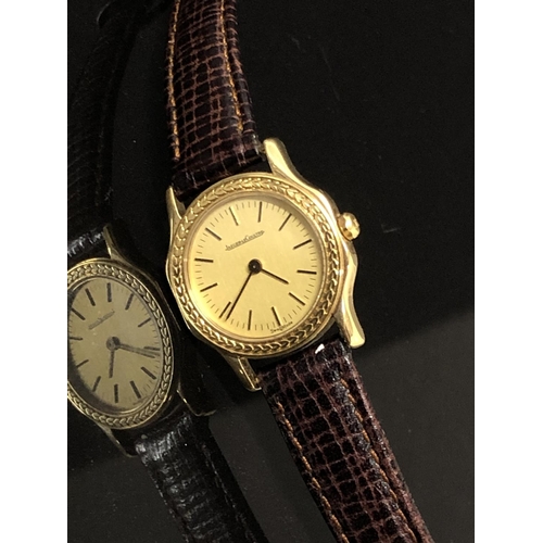 10 - LADIES 18CT YELLOW GOLD JAEGER LE COULTRE WRIST WATCH WITH GOLD DIAL & BLACK LEATHER STRAP - NO BOX ... 