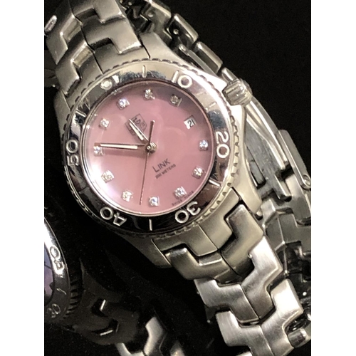 7 - LADIES STAINLESS STEEL TAG HEUR WRIST WATCH WITH PINK MOTHER OF PEARL DIAMOND DOT DIAL, QUARTZ