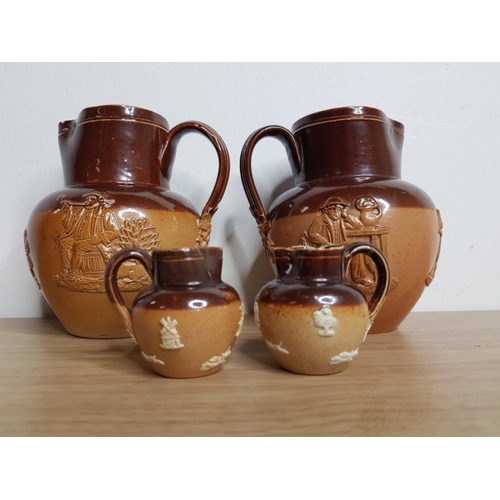 337 - 2 LARGE AND 2 SMALL DOULTON STONEWARE HARVEST JUGS