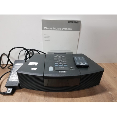 195 - BOSE WAVE RADIO/CD PLAYER WITH LEADS AND REMOTE