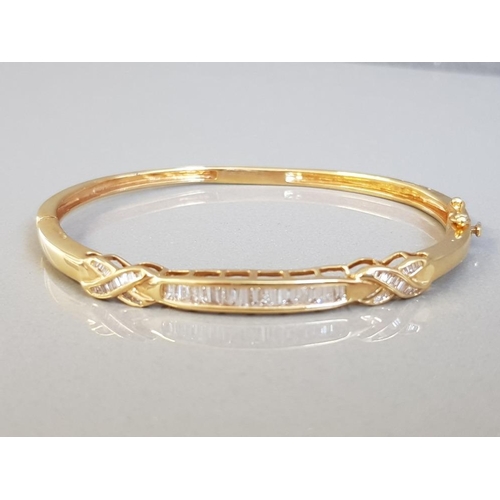 306 - 18CT YELLOW GOLD BAGUETTE DIAMOND BANGLE 18.3G