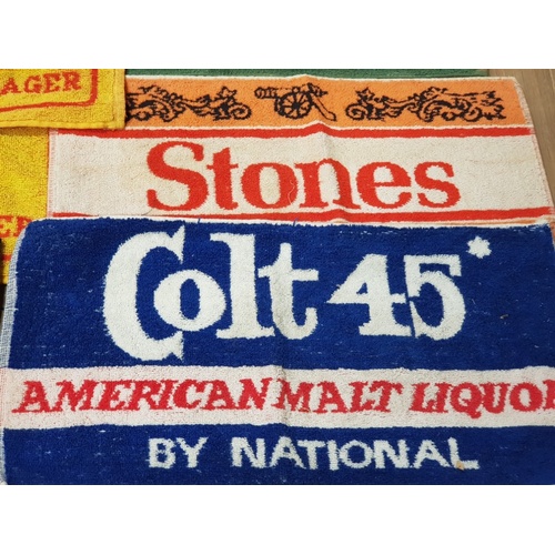 118 - A GOOD COLLECTION OF VINTAGE BAR TOWELS INCLUDING COLT 45 AND LCL ETC