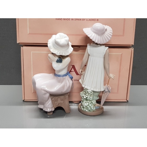 177 - 2 NAO BY LLADRO FIGURES 1049 A BIG HUG AND 1126 APRIL SHOWERS BOTH WITH ORIGINAL BOXES