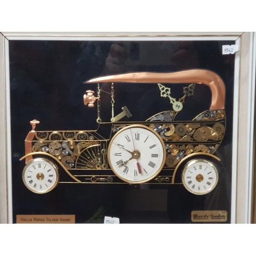 188 - A FRAMED ROLLS ROYCE SILVER GHOST WALL CLOCK MADE OUT OF POCKET WATCH PARTS 38CM BY 33CM