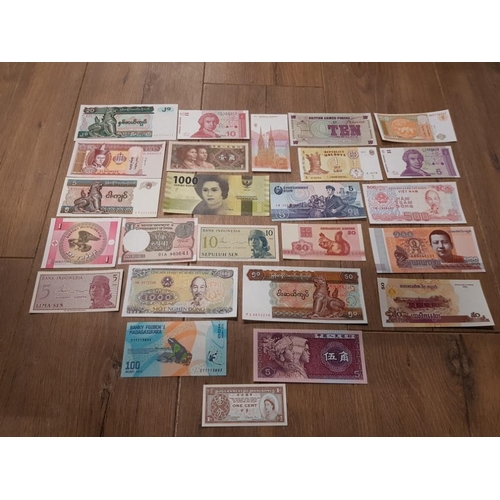 79 - 25 UNCIRCULATED WORLD BANK NOTES INC VIETNAMESE INDONESIAN AND BRITISH