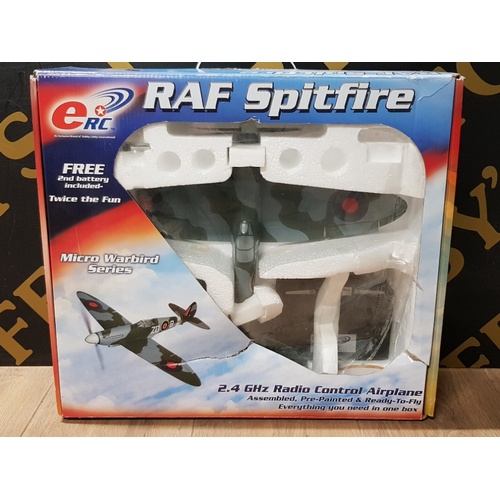 120 - BOXED ERC REMOTE CONTROL RAF SPITFIRE TOGETHER WITH 7 VINTAGE WAR PLANE BOOKS