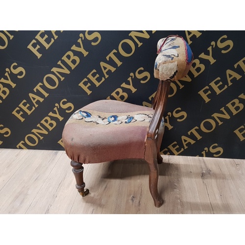 144 - EDWARDIAN MAHOGANY BEDROOM CHAIR WITH UPHOLSTERED SEAT AND BACK REST ON BRASS CASTORS