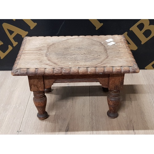 145 - SMALL CARVED OAK FOOTSTOOL 18CM HEIGHT PLUS 30CM X 20CM TOP TOGETHER WITH A PAIR OF LIGHT OAK FOOTST... 