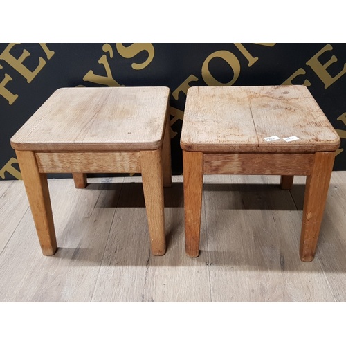 145 - SMALL CARVED OAK FOOTSTOOL 18CM HEIGHT PLUS 30CM X 20CM TOP TOGETHER WITH A PAIR OF LIGHT OAK FOOTST... 