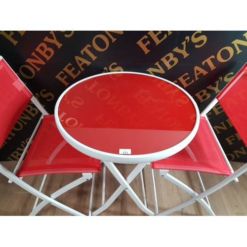 171 - A LOVELY MODERN RED AND WHITE CIRCULAR TOPPED FOLDING TABLE AND 2 MATCHING CHAIRS