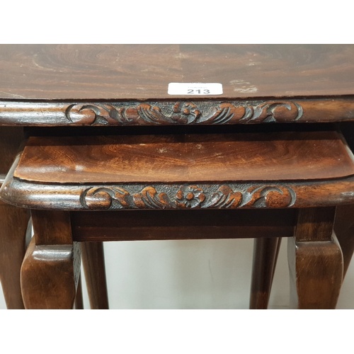 213 - A NEST OF 2 CARVED MAHOGANY TABLES WITH ROSE CARVINGS