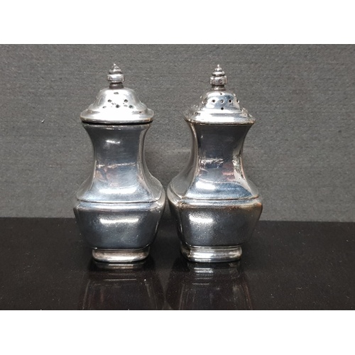 216 - A PAIR OF MAPPIN AND WEBB SALT AND PEPPER SHAKERS TOGETHER WITH A VINERS SILVER PLATED TWIN LION HAN... 