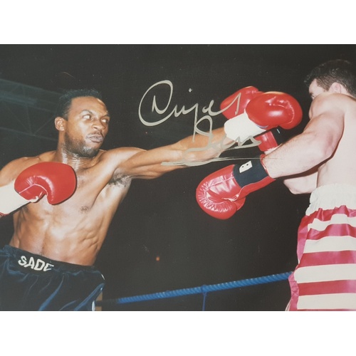 246 - FRAMED SIGNED ACTION PICTURE OF NIGEL BEN BRITISH PROFESSIONAL BOXER, WBO MIDDLEWEIGHT CHAMPION AND ... 