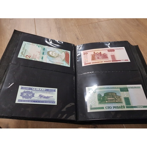 282 - AN ALBUM WHICH CONTAINS UNCIRCULATED 200 WORLD BANK NOTES INCLUDES INDONESIAN AUSTRALIAN ETC