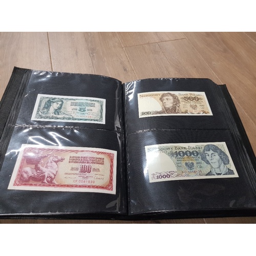 282 - AN ALBUM WHICH CONTAINS UNCIRCULATED 200 WORLD BANK NOTES INCLUDES INDONESIAN AUSTRALIAN ETC