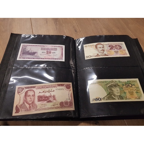 282 - AN ALBUM WHICH CONTAINS UNCIRCULATED 200 WORLD BANK NOTES INCLUDES INDONESIAN AUSTRALIAN ETC