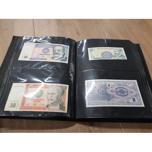 282 - AN ALBUM WHICH CONTAINS UNCIRCULATED 200 WORLD BANK NOTES INCLUDES INDONESIAN AUSTRALIAN ETC