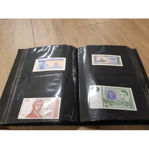 282 - AN ALBUM WHICH CONTAINS UNCIRCULATED 200 WORLD BANK NOTES INCLUDES INDONESIAN AUSTRALIAN ETC