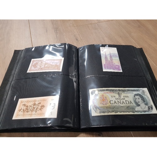 282 - AN ALBUM WHICH CONTAINS UNCIRCULATED 200 WORLD BANK NOTES INCLUDES INDONESIAN AUSTRALIAN ETC