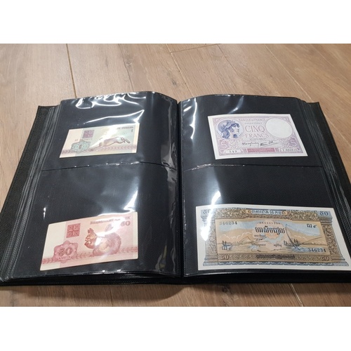 282 - AN ALBUM WHICH CONTAINS UNCIRCULATED 200 WORLD BANK NOTES INCLUDES INDONESIAN AUSTRALIAN ETC