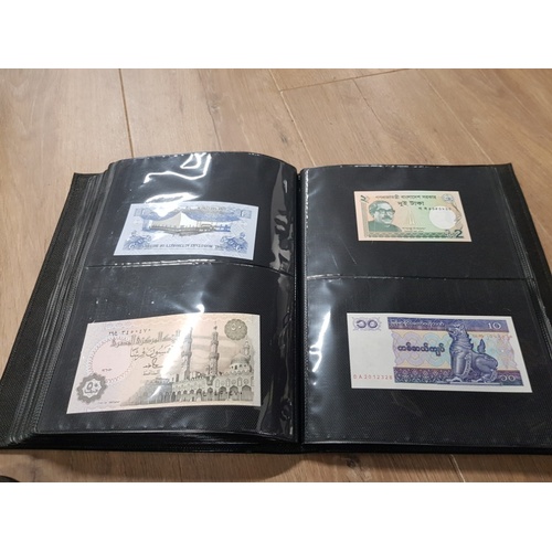 282 - AN ALBUM WHICH CONTAINS UNCIRCULATED 200 WORLD BANK NOTES INCLUDES INDONESIAN AUSTRALIAN ETC