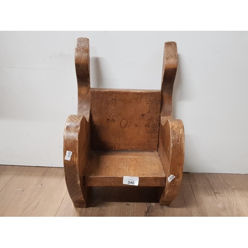 346 - PITCH PINE BOOK TROUGH IN THE FORM OF A SHEPHERDS CHAIR