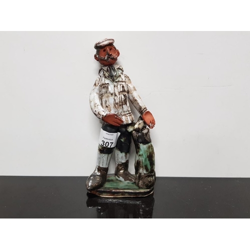 307 - SEVEN SPRINGS POTTERY MARIE WHITBY GOLFER FIGURINE