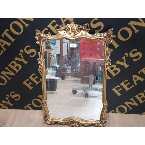 133 - HIGHLY ORNATE FRAMED WALL MIRROR