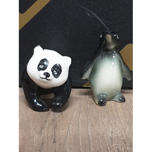 166 - BESWICK PANDA BEAR ORNAMENT TOGETHER WITH TRENTHAM ART WARE PENGUIN FIGURE