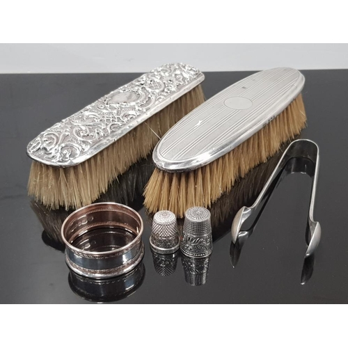 247 - 8 MISCELLANEOUS SILVER ITEMS INCLUDES 2 SILVER BACKED BRUSHES, THIMBLES, NAPKIN RING AND TONGS, BIRM... 