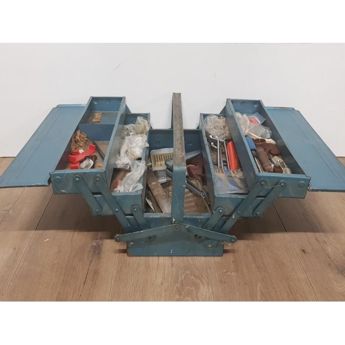 280 - A BLUE METAL CANTILEVER SEWING BOX WITH CONTENTE SUCH AS SPANNERS SCREWDRIVERS ETC