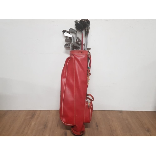 281 - A VINTAGE GOLF BAG CONTAINING ASSORTED CLUBS INC MERCURY BEN SAYERS AND GRATEX ETC